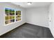 Bedroom with carpet, large window and neutral paint at 4269 David Austin Ct, Snellville, GA 30039
