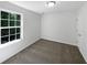 Bedroom with carpet, large window and neutral paint at 4269 David Austin Ct, Snellville, GA 30039
