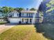 Charming two-story home with a well-manicured lawn, attached garage, and classic colonial design at 4269 David Austin Ct, Snellville, GA 30039