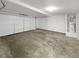 Spacious garage with an automatic door, ample room for storage, and a water heater at 4269 David Austin Ct, Snellville, GA 30039