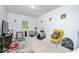 Versatile bedroom with natural light, suitable as a home office, playroom, or guest room at 475 Mcdonough Rd, Fayetteville, GA 30214