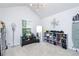 Versatile flex room featuring a vaulted ceiling, natural light, and shoe storage at 475 Mcdonough Rd, Fayetteville, GA 30214