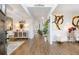 Welcoming foyer with beautiful hardwood floors and decorative accents is the perfect entrance for this lovely home at 475 Mcdonough Rd, Fayetteville, GA 30214