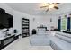 Entertainment room with a large television and lounge seating at 475 Mcdonough Rd, Fayetteville, GA 30214