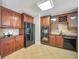 Well-equipped kitchen with custom cabinets, stainless steel appliances, and a functional layout for preparing meals at 621 Champions Dr, Mcdonough, GA 30253