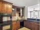 Elegant kitchen featuring custom cabinetry, a wine rack, and modern appliances offers style and functionality at 621 Champions Dr, Mcdonough, GA 30253