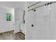 Bathroom featuring a shower with bronze fixtures and a single sink vanity at 191 Gates Mill Dr, Lawrenceville, GA 30045
