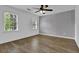 Bedroom featuring hardwood floors, neutral paint, and natural light at 191 Gates Mill Dr, Lawrenceville, GA 30045