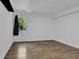 Bedroom with hardwood floors, recessed lighting, and large window at 191 Gates Mill Dr, Lawrenceville, GA 30045
