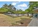 Fenced community pool area with lounge chairs, offering a refreshing retreat at 191 Gates Mill Dr, Lawrenceville, GA 30045