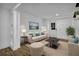 Cozy living room featuring sofa, chairs, decor and shiplap walls at 191 Gates Mill Dr, Lawrenceville, GA 30045