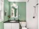 Clean bathroom with updated fixtures, subway tile shower, and sleek vanity with black countertop at 1919 Edinburgh Ne Ter, Atlanta, GA 30307