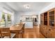 Open concept dining room with hardwood floors that flows into a modern kitchen at 1919 Edinburgh Ne Ter, Atlanta, GA 30307