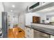 Spacious kitchen featuring stainless steel appliances, granite countertops, and seamless flow to other rooms at 1919 Edinburgh Ne Ter, Atlanta, GA 30307