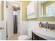 Bathroom featuring a vanity with storage and a toilet with a view into the shower at 2920 Appling Dr, Atlanta, GA 30341