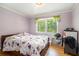 Cozy bedroom with hardwood floors, large window and natural light at 2920 Appling Dr, Atlanta, GA 30341