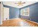 Cozy bedroom with hardwood floors, ceiling fan and natural light at 2920 Appling Dr, Atlanta, GA 30341