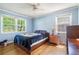 Bedroom with hardwood floors, natural light, and neutral paint at 2920 Appling Dr, Atlanta, GA 30341