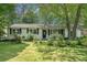 Charming ranch-style home with a well-manicured lawn and mature trees at 2920 Appling Dr, Atlanta, GA 30341
