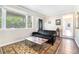 Comfortable living room with tile flooring, a view of the front yard, and a cozy atmosphere at 2920 Appling Dr, Atlanta, GA 30341