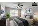 This staged bedroom is a relaxing place to be at 6757 Delaware Bnd, Fairburn, GA 30213