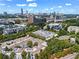 Breathtaking aerial view of the city skyline with lush greenery and convenient parking, showcasing urban living at 821 Ralph Mcgill Ne Blvd # 2412, Atlanta, GA 30306