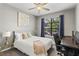 Bedroom with window view, ceiling fan, carpet flooring and small desk at 821 Ralph Mcgill Ne Blvd # 2412, Atlanta, GA 30306