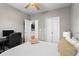 Bedroom with ceiling fan, neutral walls, carpet flooring, and closet at 821 Ralph Mcgill Ne Blvd # 2412, Atlanta, GA 30306