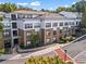 Condominium with three stories, balconies, and professional landscaping and exterior stairwell at 821 Ralph Mcgill Ne Blvd # 2412, Atlanta, GA 30306