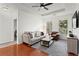Bright living room with hardwood floors and large windows, with a view of the kitchen at 821 Ralph Mcgill Ne Blvd # 2412, Atlanta, GA 30306
