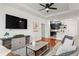 Open concept living room and kitchen area with modern decor and lots of natural light at 821 Ralph Mcgill Ne Blvd # 2412, Atlanta, GA 30306