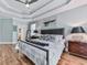 A main bedroom boasts high ceilings, hardwood floors, and abundant natural light at 1076 Pinyan Ln, Canton, GA 30115