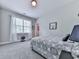 Inviting bedroom with soft, natural light and plush carpeting, creating a serene retreat at 1076 Pinyan Ln, Canton, GA 30115