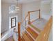 Grand foyer featuring a chandelier, hardwood floors, staircase, and a large window at 2009 Pine Forest Ct, Jonesboro, GA 30236