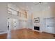 Bright and airy living room with hardwood floors, fireplace, and built-in shelving at 2009 Pine Forest Ct, Jonesboro, GA 30236