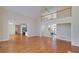 Spacious living room featuring hardwood floors, an open layout, and a second story at 2009 Pine Forest Ct, Jonesboro, GA 30236