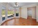 Bright sunroom with hardwood floors, large windows, and views of the outdoors at 2009 Pine Forest Ct, Jonesboro, GA 30236