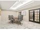 Modern conference room with sleek gray chairs, wooden table, and stylish marble flooring at 2870 Pharr Court S Nw # 1608, Atlanta, GA 30305
