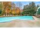Sparkling outdoor pool surrounded by lush landscaping and comfortable lounge chairs at 2870 Pharr Court S Nw # 1608, Atlanta, GA 30305