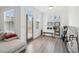 Bright room with large window, golf gear, and access to the outdoor deck at 3130 Bennett Creek Ln, Suwanee, GA 30024