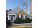 Charming home with stone accents, manicured landscaping, and inviting front porch, offers great curb appeal at 3911 Delfaire Trce, Cumming, GA 30040