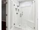 Shower features white subway tiles, a glass enclosure, and a built-in seat at 3911 Delfaire Trce, Cumming, GA 30040