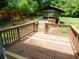 Backyard deck with custom structure, with views of a tree-lined outdoor space at 464 Mephisto Cir, Lawrenceville, GA 30046