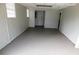 Spacious basement area with painted walls and a neutral-colored floor, offering a versatile space at 464 Mephisto Cir, Lawrenceville, GA 30046