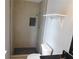 Updated bathroom featuring tiled shower with black accents, a sleek toilet, and a modern vanity at 464 Mephisto Cir, Lawrenceville, GA 30046