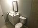 Stylish bathroom featuring a modern vanity, white countertops, and a sleek toilet at 464 Mephisto Cir, Lawrenceville, GA 30046