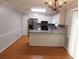Eat-in kitchen with updated stainless steel appliances and granite countertop at 464 Mephisto Cir, Lawrenceville, GA 30046