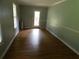 Bright room with wood floors and neutral color at 464 Mephisto Cir, Lawrenceville, GA 30046