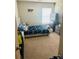 bedroom featuring playful decor and a blue comforter at 6905 Rogers Pt, Lithonia, GA 30058