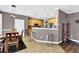 Charming eat-in kitchen featuring stainless steel appliances and tile floors at 92 Creek Front Way, Lawrenceville, GA 30043